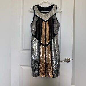 Women’s Large sequin cocktail dress. 35 inches long. Stretchy back with zipper.